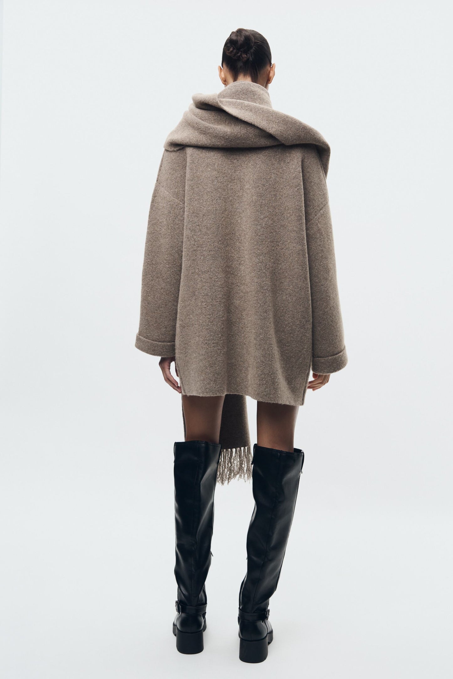Knitted coat with scarf