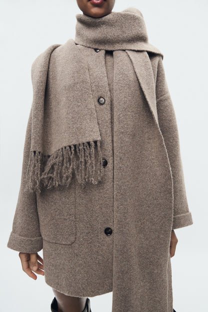 Knitted coat with scarf
