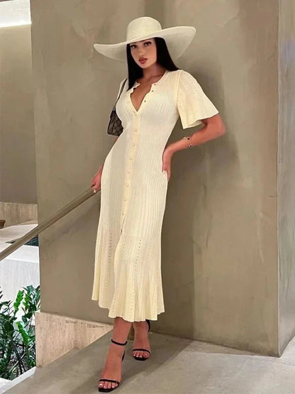 Bianca pleated knit midi dress with trumpet sleeves