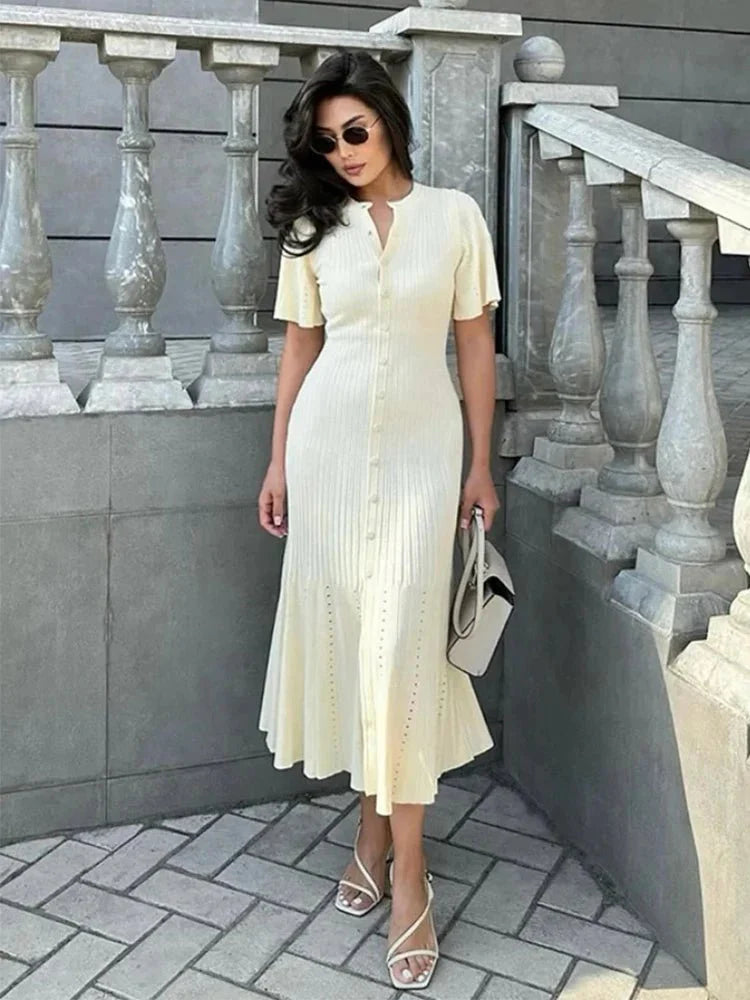 Bianca pleated knit midi dress with trumpet sleeves