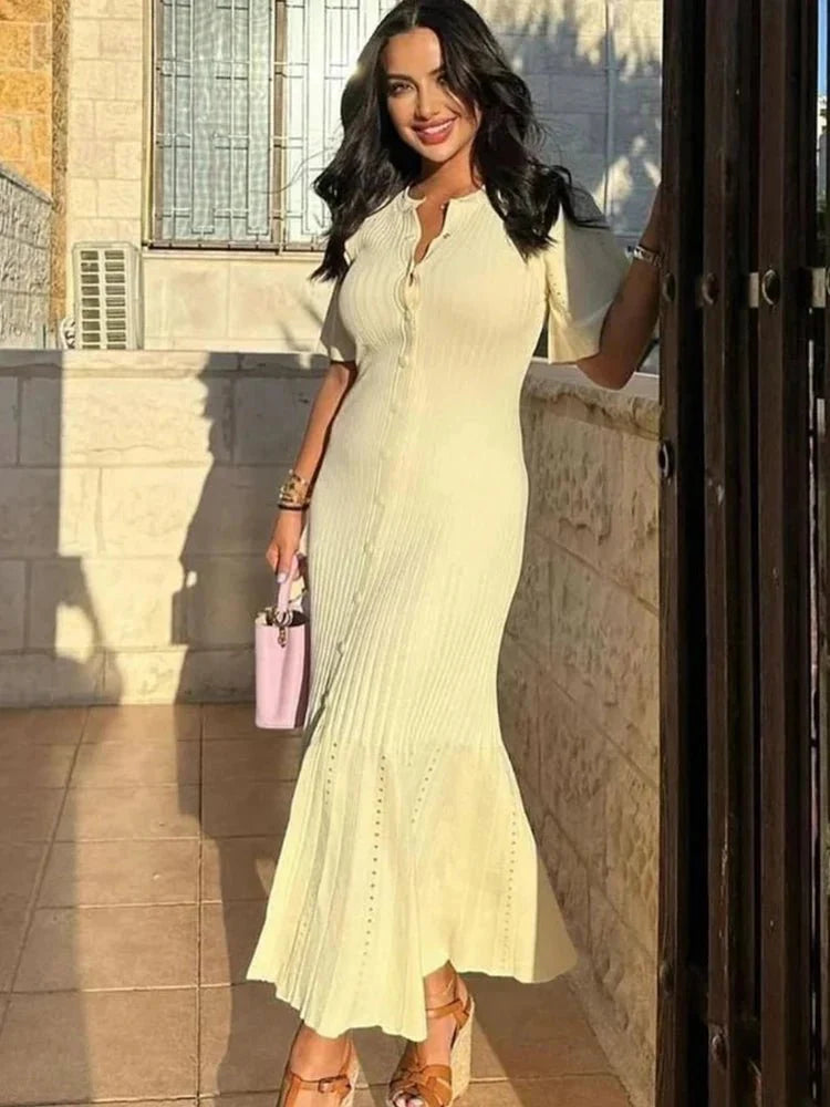 Bianca pleated knit midi dress with trumpet sleeves