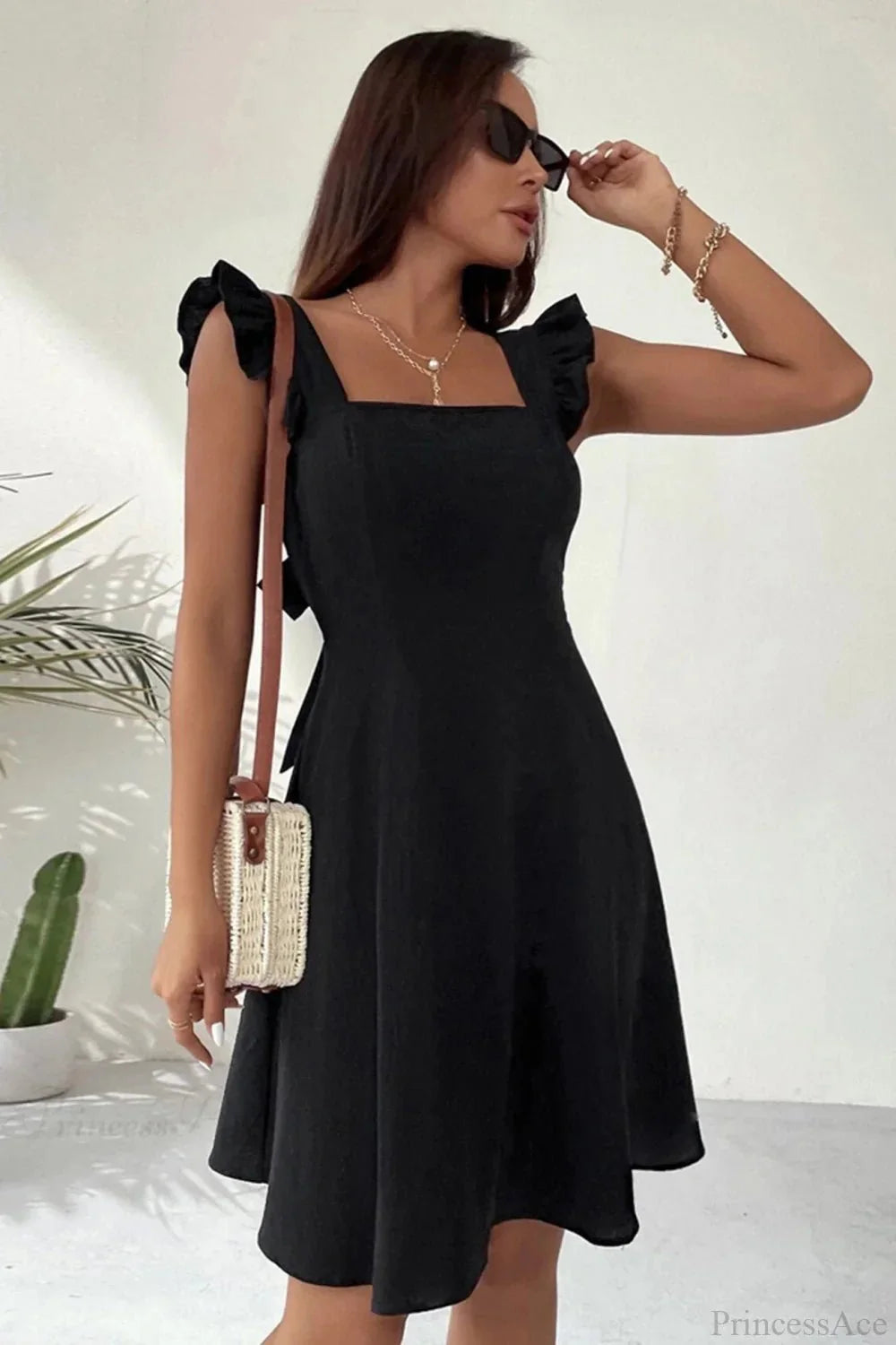 Bianca Ruffled Back-Knot Sleeveless Mini Dress