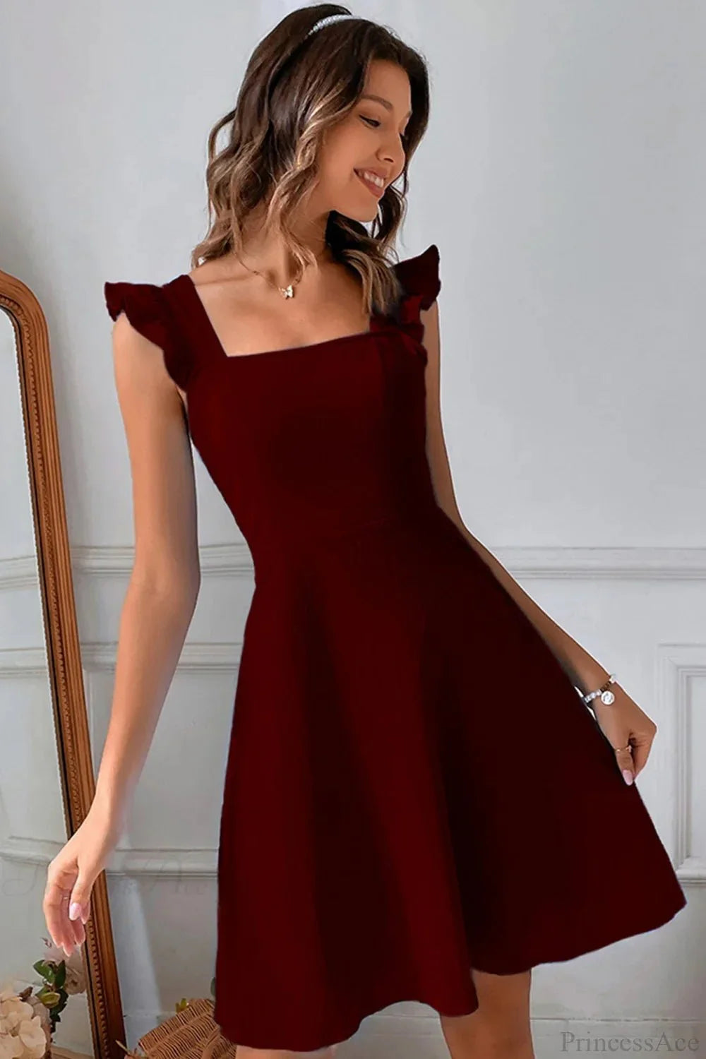 Bianca Ruffled Back-Knot Sleeveless Mini Dress