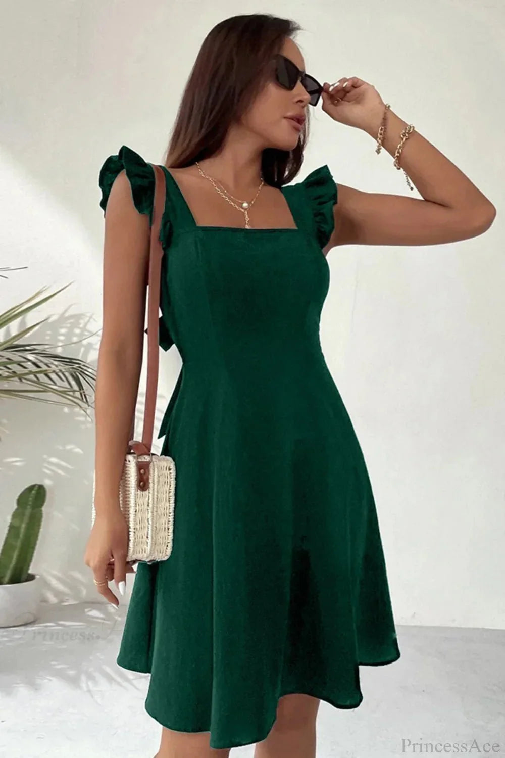 Bianca Ruffled Back-Knot Sleeveless Mini Dress