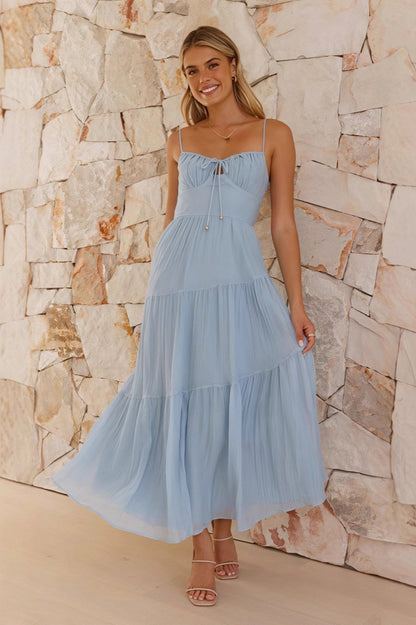 Maxi dress with spaghetti straps, open back, and flared skirt