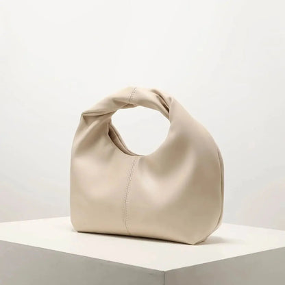 Gelyn Clutch Leder Tasche