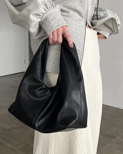 Gelyn Clutch Leder Tasche