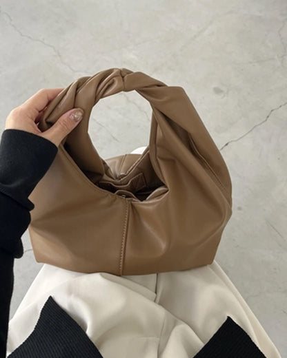 Gelyn Clutch Leder Tasche