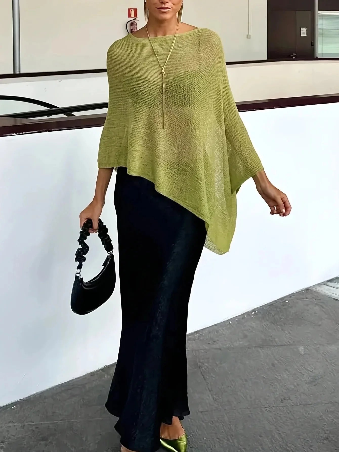 Celeste Strickponcho mit Fledermausärmeln